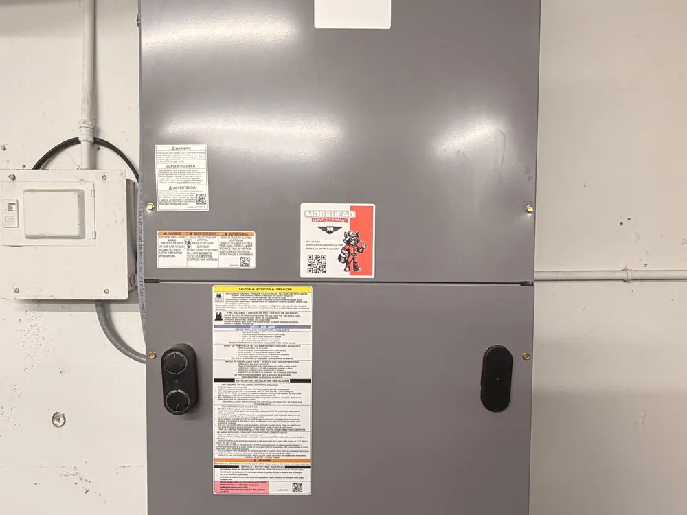 A furnace and air handler installed by Moorhead Service Company in a New Braunfels home.