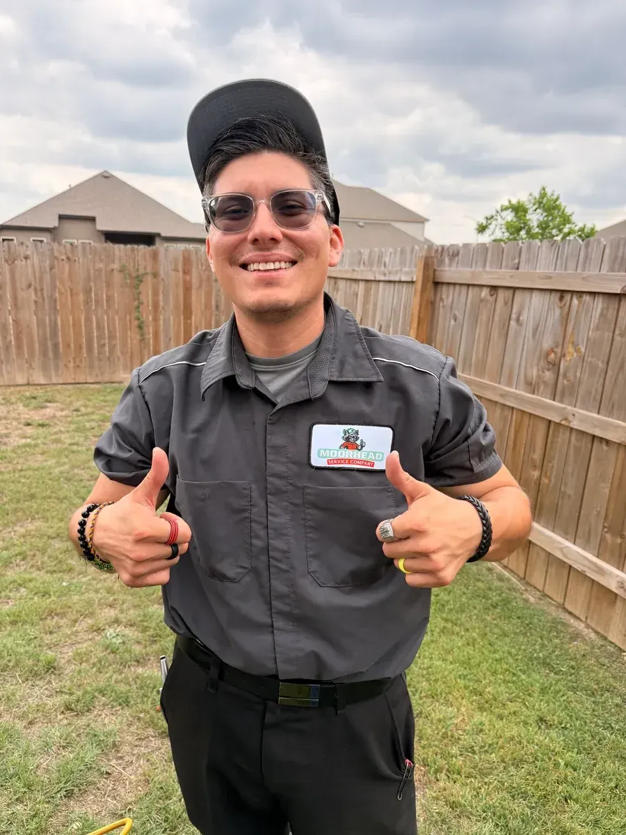 Moorhead Service Company technician, smiling with thumbs up